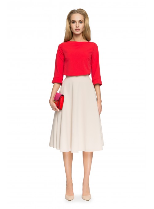Elegantiškas smėlio spalvos vidutinio ilgio sijonas
